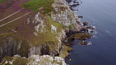 Flying-above-the-rocky-cliffside-of-north-France