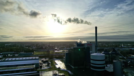 Large-green-energy-factory-in-Latvia-during-a-colorful-sunrise-in-Jelgava