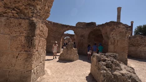 POV-shot-of-exploring-ancient-cities-ruins-of-Carthage-in-Tunisia