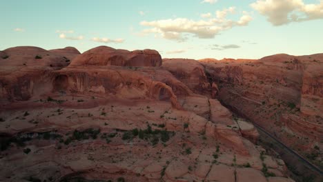 Aerial-drone-view-pullback-shot-of-Corona-Arch-in-Moab,-Utah