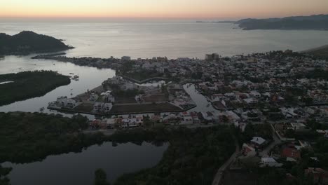 Barra-de-Navidad-Aerial-of-Jalisco-state-in-Mexico-drone-sunset-footage
