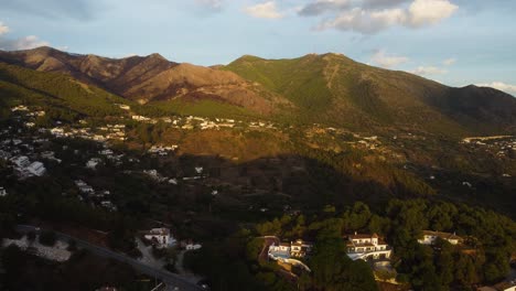 Spanish-mountains-and-white-buildings-of-Mijas-town,-aerial-view