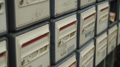 Cluster-of-Vintage-Mailboxes,-Lindoso,-Portugal