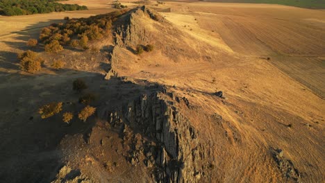 The-View-of-a-Rocky-Terrain-Bathed-in-the-Warm-Hues-of-the-Golden-Hour---Wide-Shot