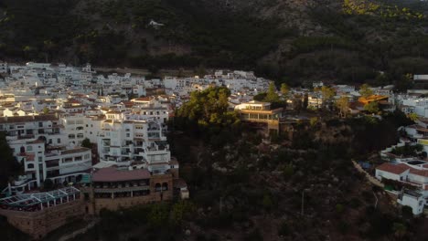 White-iconic-buildings-of-Mijas-town,-aerial-view