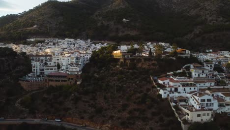 White-buildings-of-Mijas-township-in-Spain,-Andalusia,-aerial-view