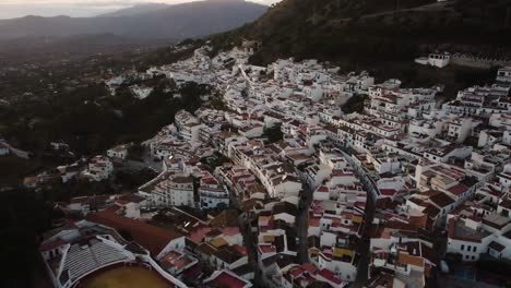 Iconic-township-of-Mijas-with-white-buildings,-aerial-drone-view