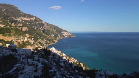 Drone-shot-flying-over-Positano,-Italy-along-the-Amalfi-Coast