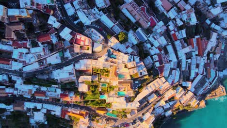 Top-down-drone-shot-flying-over-Positano,-Italy