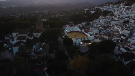 Landmark-buildings-of-Mijas-township-with-white-estates,-aerial-drone-view