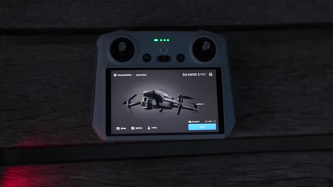 Overlooking-DJI-RC-Controller-With-LCD-Screen-On-Table