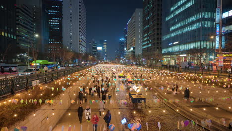 Cheonggyecheon-Stream-Christmas-Decorations---People-Walking-Under-Hanging-on-Wires-Lantern-Bulbs-Enjoying-Lantern-Festival-in-Seoul