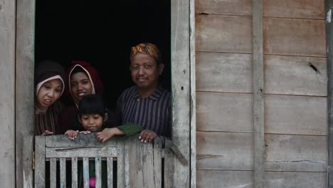 Happy-Javanese-family-with-their-two-children,-Central-Java,-Indonesia