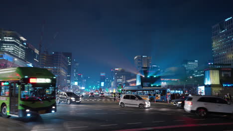 Night-Car-Traffic-on-Sejong-daero-Road-Near-Gwanghwamun-Gate-During-Seoul-Light-Festival-in-Gwanghwamun-Square---panning