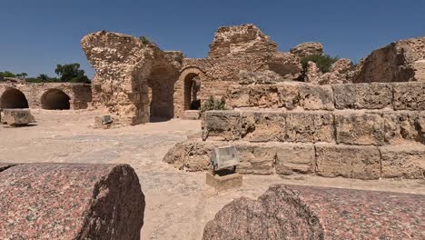 Walking-shot-in-historical-ruins-of-Roman-Empire-in-Carthage,-Tunisia