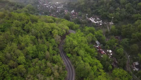 Aerial-view,-winding-road-to-Mangunan-peak-tourist-attraction