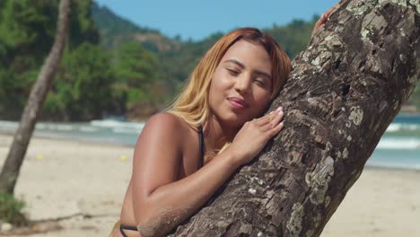 A-youthful-girl-in-a-bikini-enjoys-a-Caribbean-beach-with-white-sands
