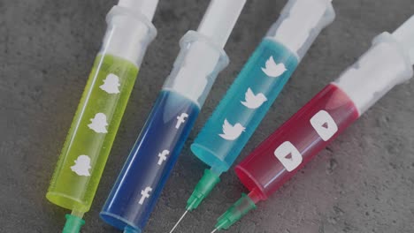 several-syringes-filled-with-colorful-liquid-symbolizing-social-media-addiction