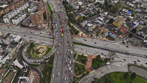 Bogota-Colombia-Aerial-v43-birds-eye-view,-fly-around-the-intersection-of-Avenue-NQS-and-El-Dorado-highway-capturing-busy-traffics-and-Teusaquillo-neighborhood---Shot-with-Mavic-3-Cine---November-2022