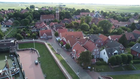 Aerial-Drone-Footage:-Ditzum-with-Windmill-and-Lighthouse,-Summer-Day