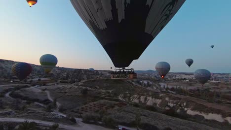 Hot-Air-Balloon-Flight-In-Cappadocia,-Turkey---Aerial-FPV