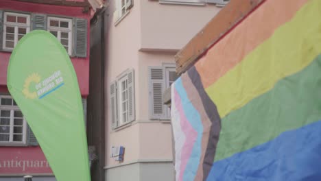 LGBTQ+-flag-and-flag-of-the-political-party-Bündnis-90-Die-Grünen
