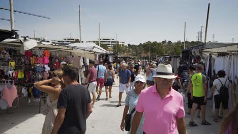 Shoppers-make-their-way-along-the-main-aisle-of-the-Market-at-Cala-De-Mijas-on-the-Costa-Del-Sol