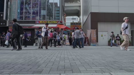 People-Walking-and-Congregating-on-the-Street-in-Tokyo,-Japan