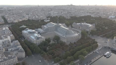 Aerial-drone-shot-of-the-Grand-Palais-in-paris,-France-while-sunset