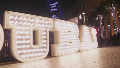 Famous-I-love-Dubai-Sign-at-the-Dubai-Mall-in-Dubai,-United-Arab-Emirates-at-night