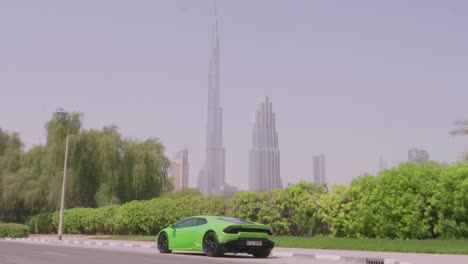 Green-Sports-Car-Racing-in-Dubai,-United-Arab-Emirates