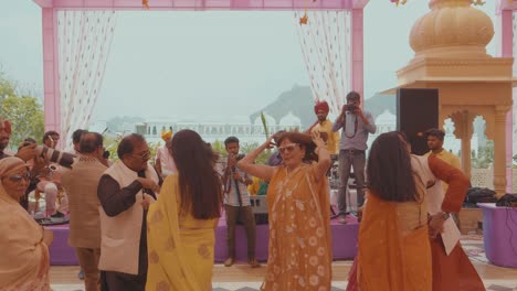 Indian-People-celebrating-and-dancing-at-a-weeding-in-Udaipur,-India