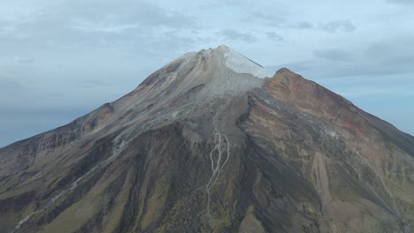 Aerial-view-of-the-highest-mountain-in-Mexico,-Orizaba-Peak-National-Park-with-the-last-remaining-glacier-in-the-country-due-to-global-warming