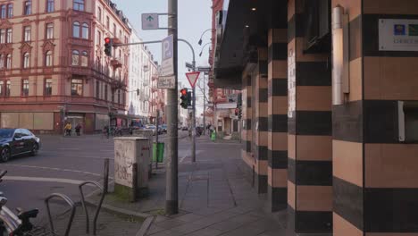 walking-along-a-street-in-Frankfurt,-Germany