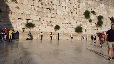 Men-Praying-at-the-Western-Wall-in-Jerusalem,-Israel