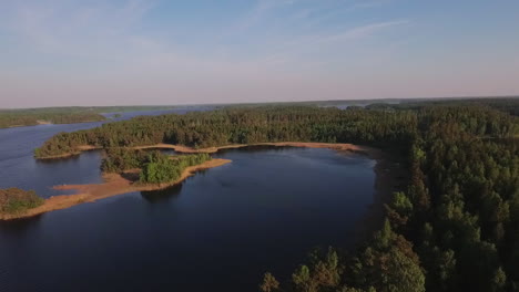 Aerial-of-a-lake-and-forest-in-Sweden