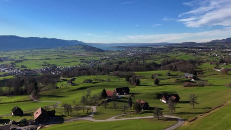 Aerial-view-over-Uznach-and-Lake-Zurich-on-a-sunny-day-in-Switzerland