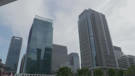 Modern-looking-Skyscrapers-in-Tokyo,-Japan-displaying-futuristic-architecture