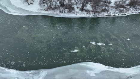 Overhead-view-of-ice-floating-down-a-river-in-rural-Washington