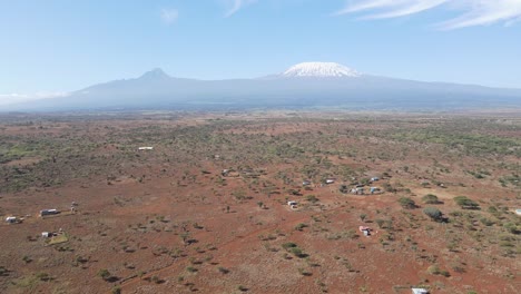 African-savanna-and-farmlands-at-footstep-of-Mount-Kilimanjaro,-Kenya,-aerial-view