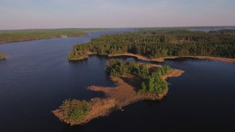 Aerial-of-a-lake-and-forest-in-Sweden