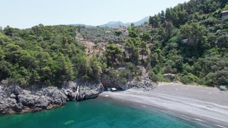 Evoia-island-Greece-summer-holiday-destination-in-europe-drone-reveal-beach-and-cliff-in-wilderness