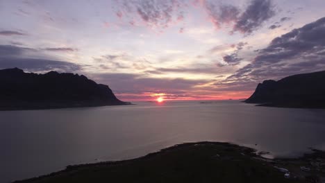 Aerial-of-a-fjord-at-sunset-on-Lofoten,-Norway