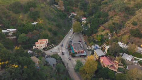 Drone-Footage-Over-Busy-Intersection-in-Laurel-Canyon,-California,-Famous-Residential-Neighborhood-as-Seen-by-Air