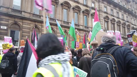 Close-up-of-people-waiting-to-march-in-Glasgow