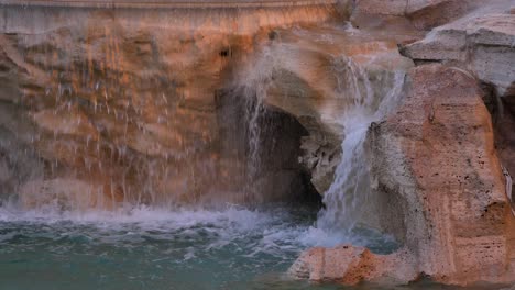 Close-detailed-shot-of-the-waterfall-of-the-Trevi-Fountain