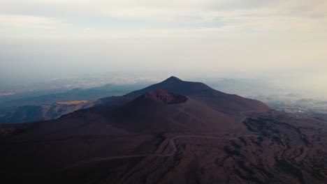 Drone-flying-over-a-volcano-crater-at-Mount-Etna,-Sicily