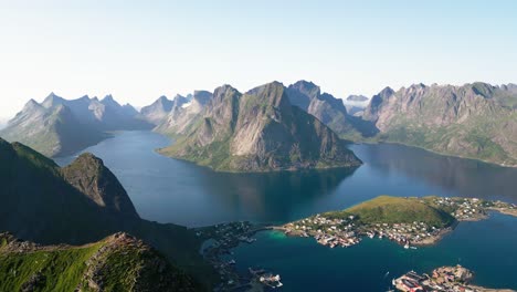 On-a-sunny-day,-an-aerial-view-shows-one-of-the-best-scenes-one-can-see-on-a-hike-in-Reinebringen,-located-in-the-Lofoten-Islands-of-Norway