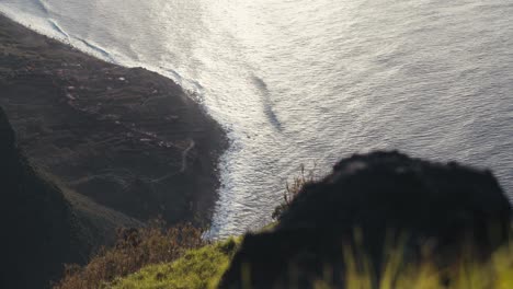 Sun-flare-hits-ocean-on-the-beach-of-Madeira