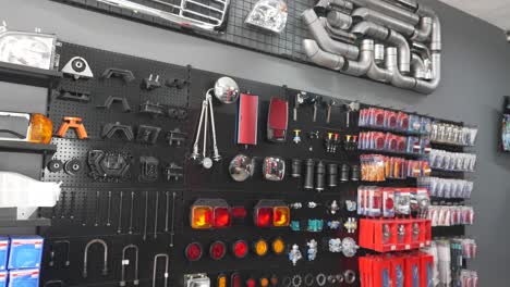 The-interior-of-a-modern-car-and-truck-parts-store-with-displays-of-tools,-accessories,-repair-and-maintenance-parts-for-sale